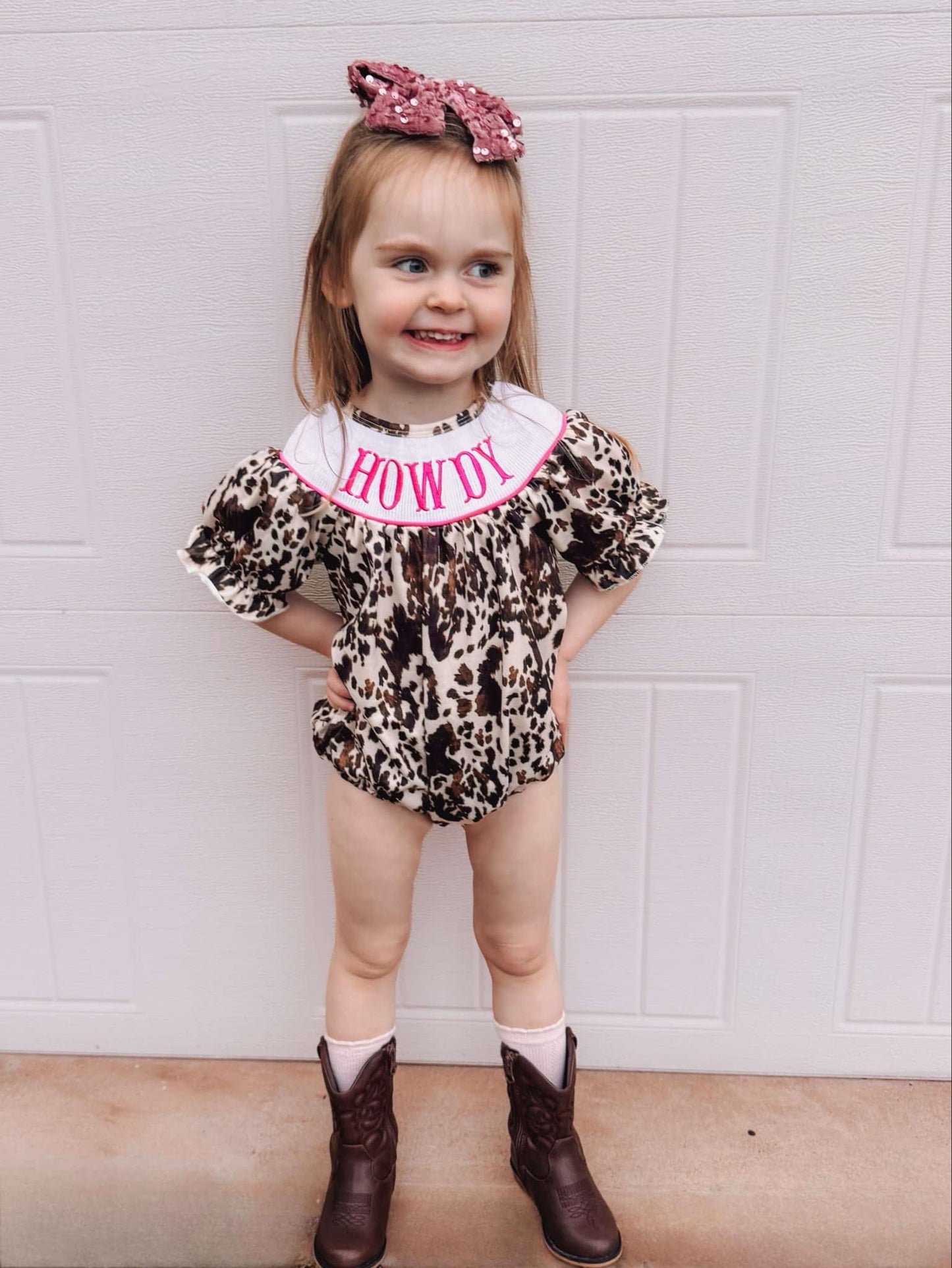Smocked cowhide howdy romper