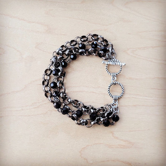 **Black Faceted Triple Strand Beaded Bracelet